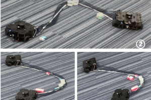 Object Gathering with a Tethered Robot Duo